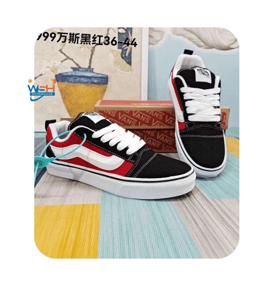 Black Vans Sneakers with White Stripe