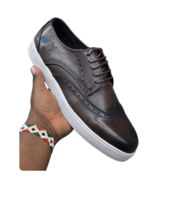 Crafted from high-quality brown leather for durability and style. Features classic brogue detailing for a sophisticated look. Comfortable white rubber sole for all-day wear. Lace-up design ensures a secure fit. Available in sizes 39 to 45 to accommodate various foot sizes. Perfect for both casual and semi-formal occasions. Timberland logo embossed on the side for brand authenticity. Priced at 3800, offering great value for premium quality