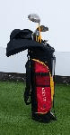 KIDS GOLF CLUB SET - SET OF 5 RIGHT HANDED CLUBS IN STAND BAG. 9-12YRS, MAKE: LEIVER (BLACK, RED & YELLOW)